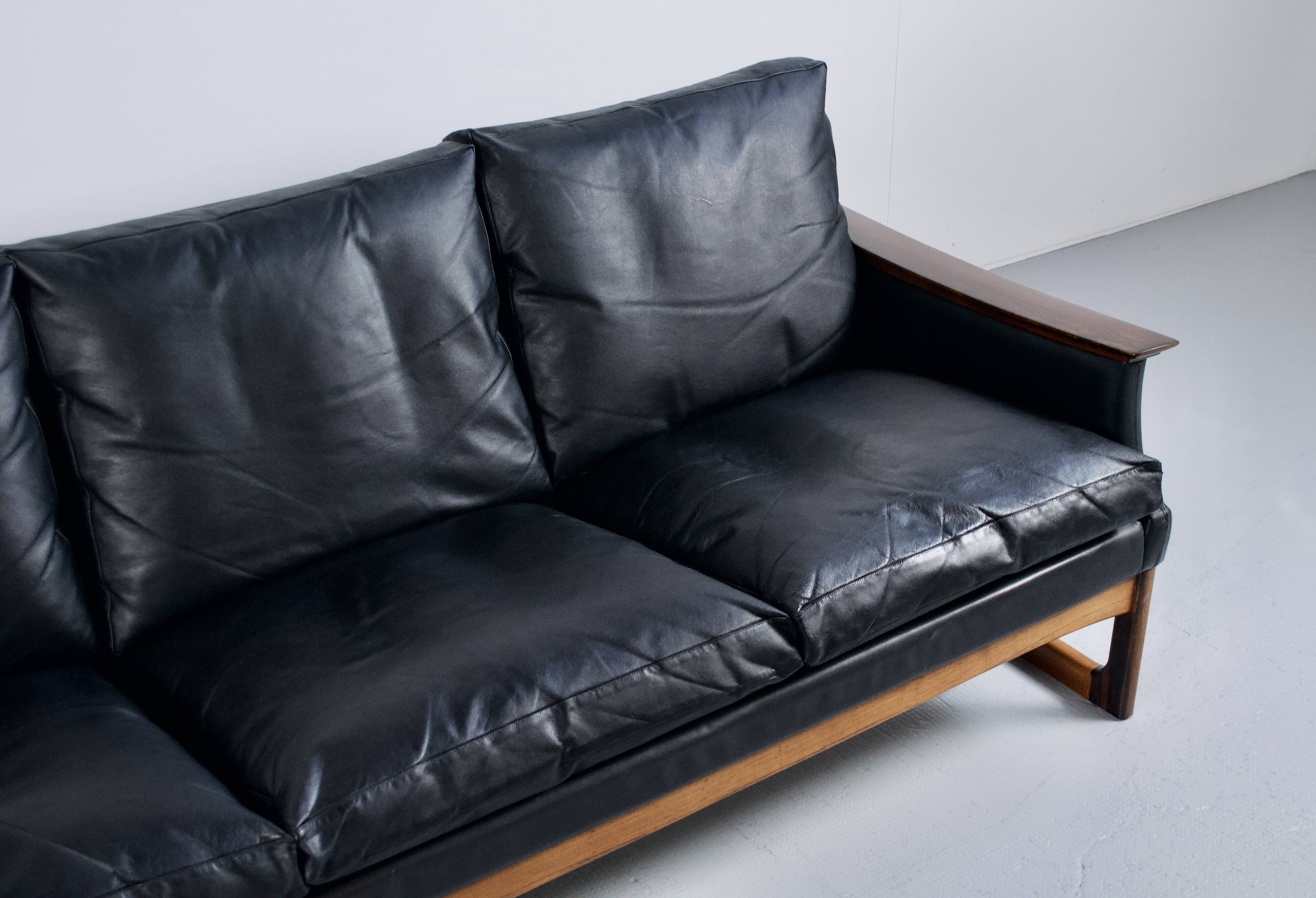 Scandinavian 3-seater sofa in leather and rosewood from the 60s