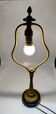Antique lamp known as a lyre in bronze and marble from the late 19th century.