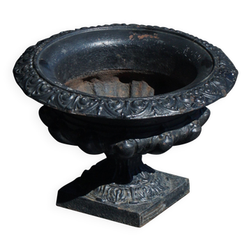Antique French cast iron garden urn with decorative border, early 20th century.
