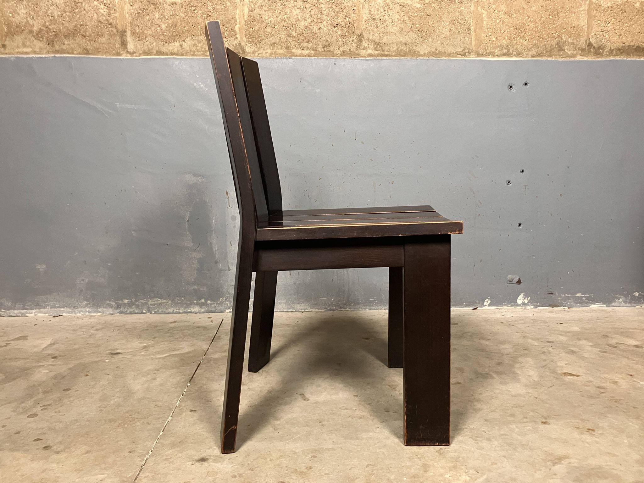 Brutalist and modernist dining chairs from the 1970s in architectural brown wood.