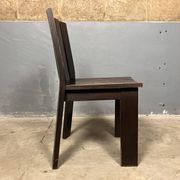 Brutalist and modernist dining chairs from the 1970s in architectural brown wood.