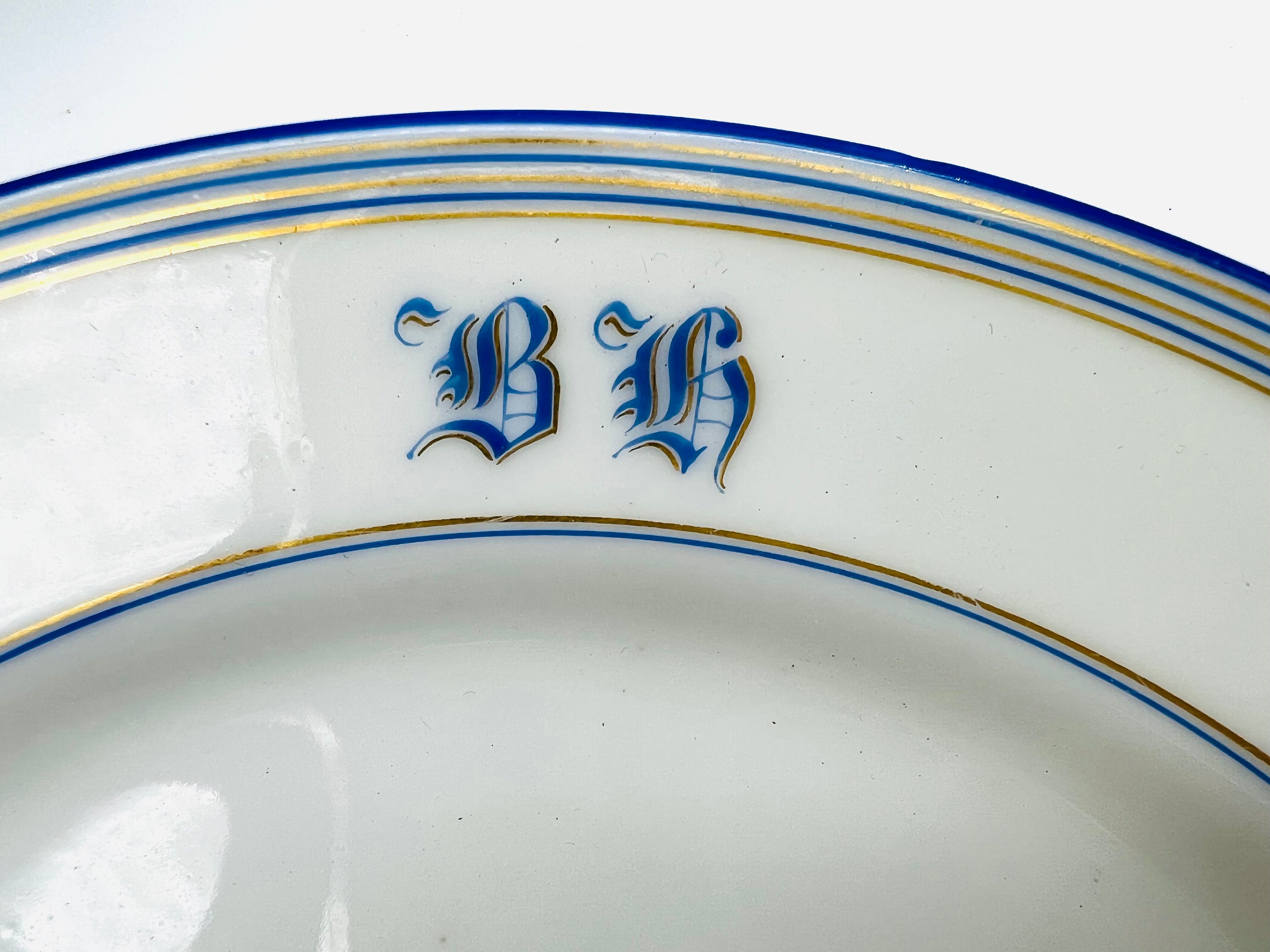 White and blue dessert plate with monogram BH