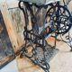 Vintage wooden table with a cast iron base.