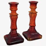 Pair of amber glass candlesticks