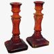 Pair of amber glass candlesticks