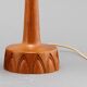 Sculpted teak table lamps for Ab Stilarmatur Tranas, Sweden, 1960.
