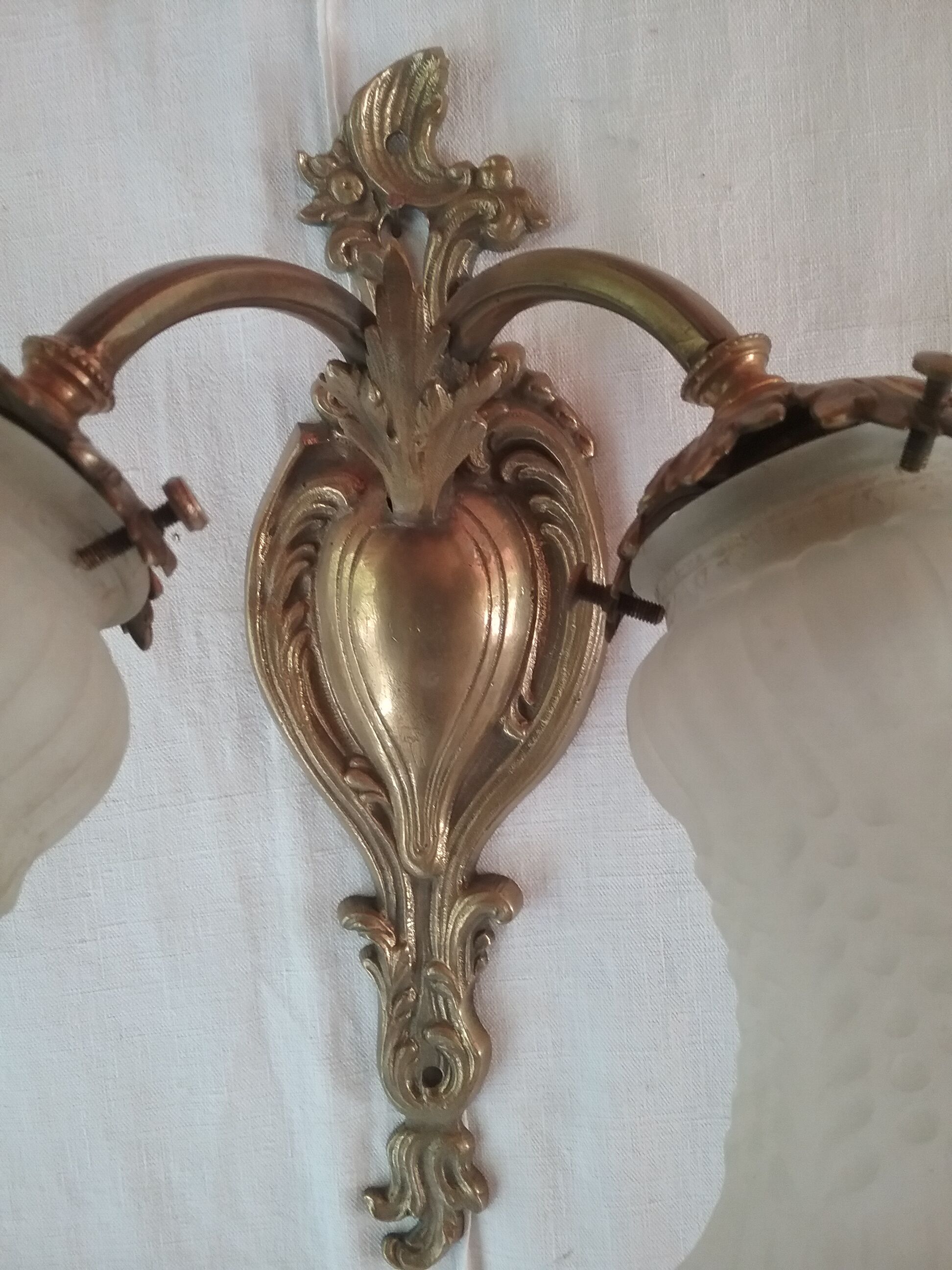 Double bronze sconce