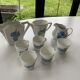 Coffee service in white porcelain pattern pink blue art deco