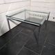 Chrome metal coffee table with a glass top from the 1970s.