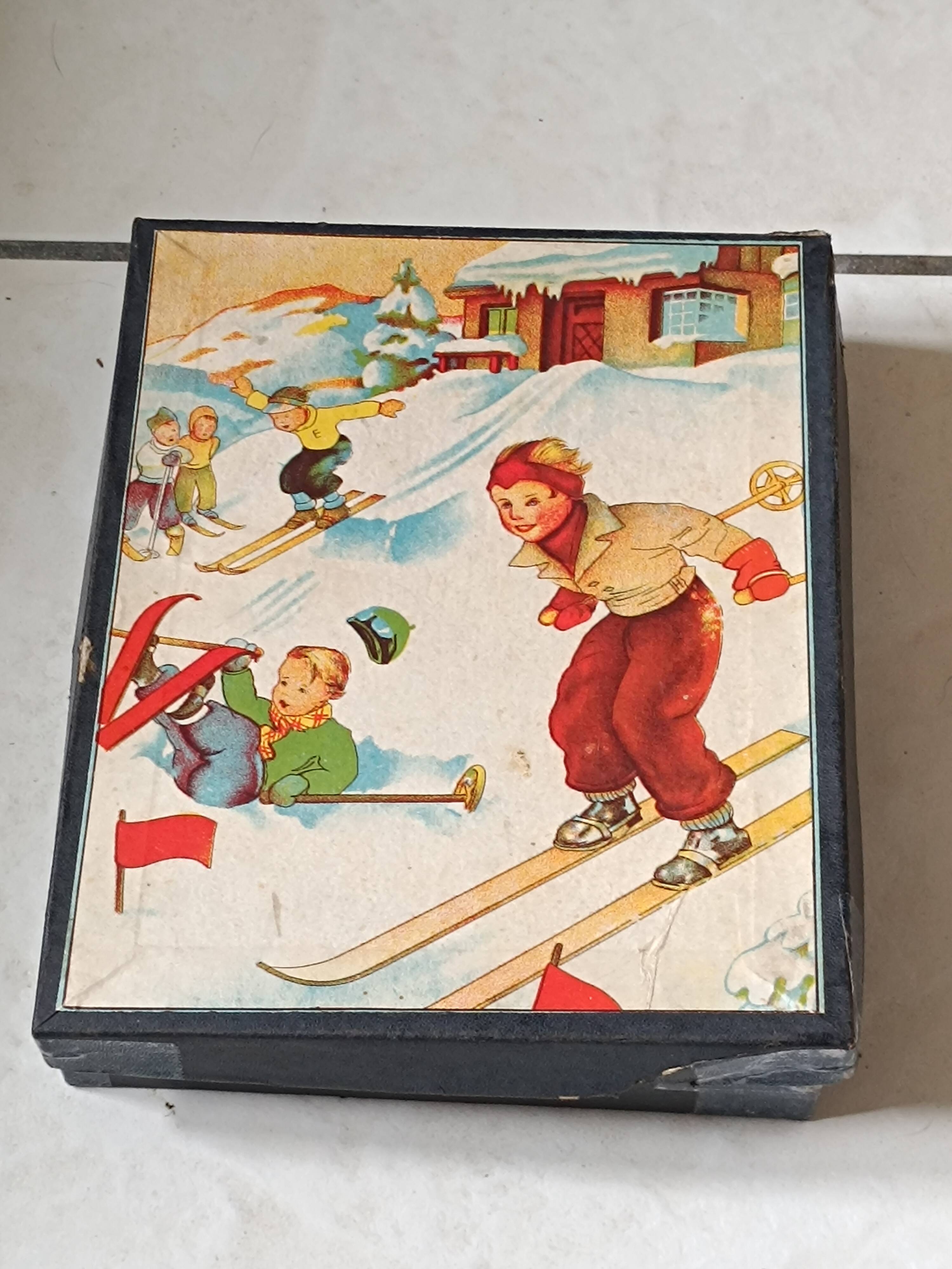 Cardboard box with wooden alphabet cubes from the 60s