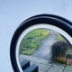 Round vintage mirror in brown resin – 1970s modernist design