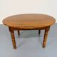 Oval dining table in solid wood with turned legs from the 1950s.
