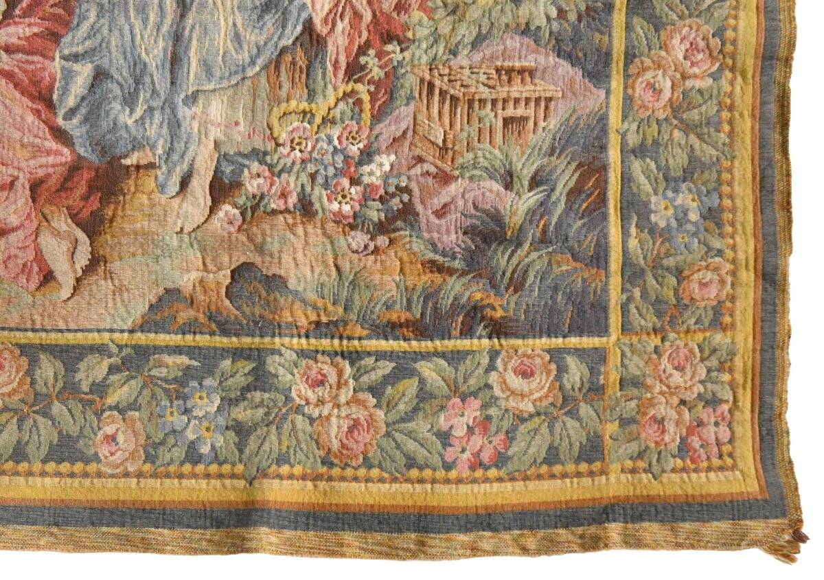 Wall tapestry featuring a pastoral scene.
