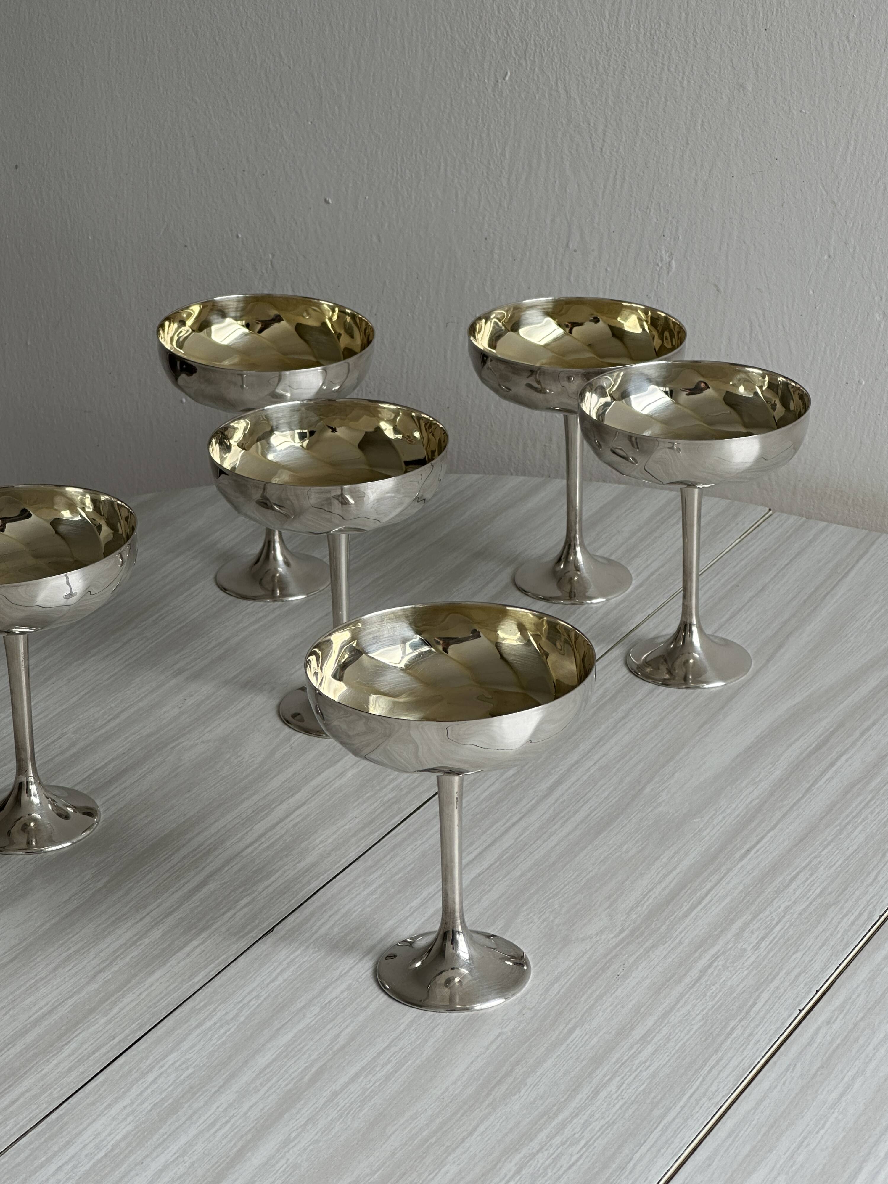 6 shiny metal footed bowls