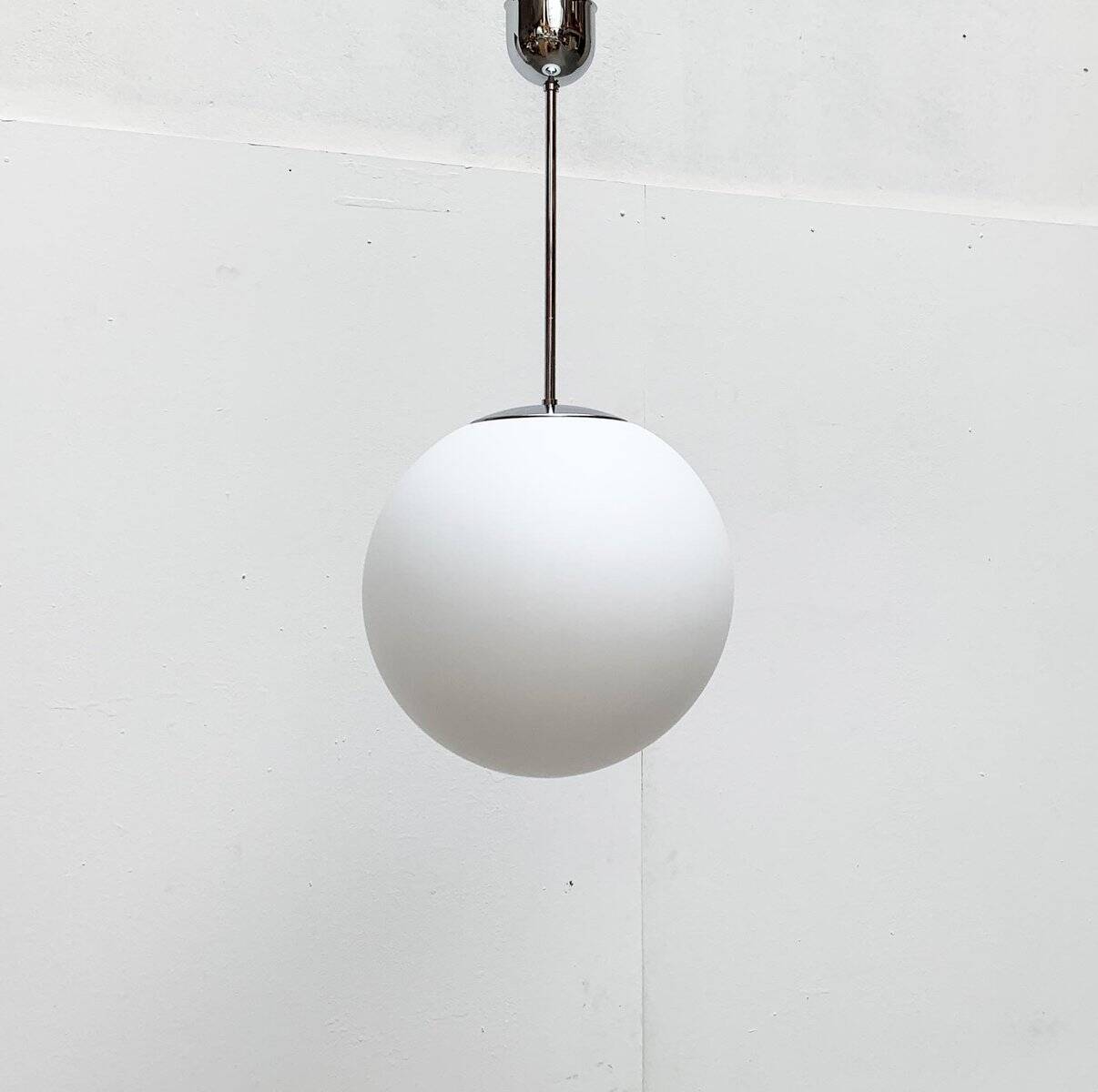 Vintage German space age glass ball pendant lamp by Limburg.