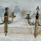 Pair of Louis XVI style bronze wall sconces