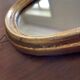 Miroir doré de style Louis XV sobre 32 X 22