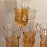 Four iridescent honey blown glass glasses