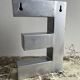 Metal sign letter E