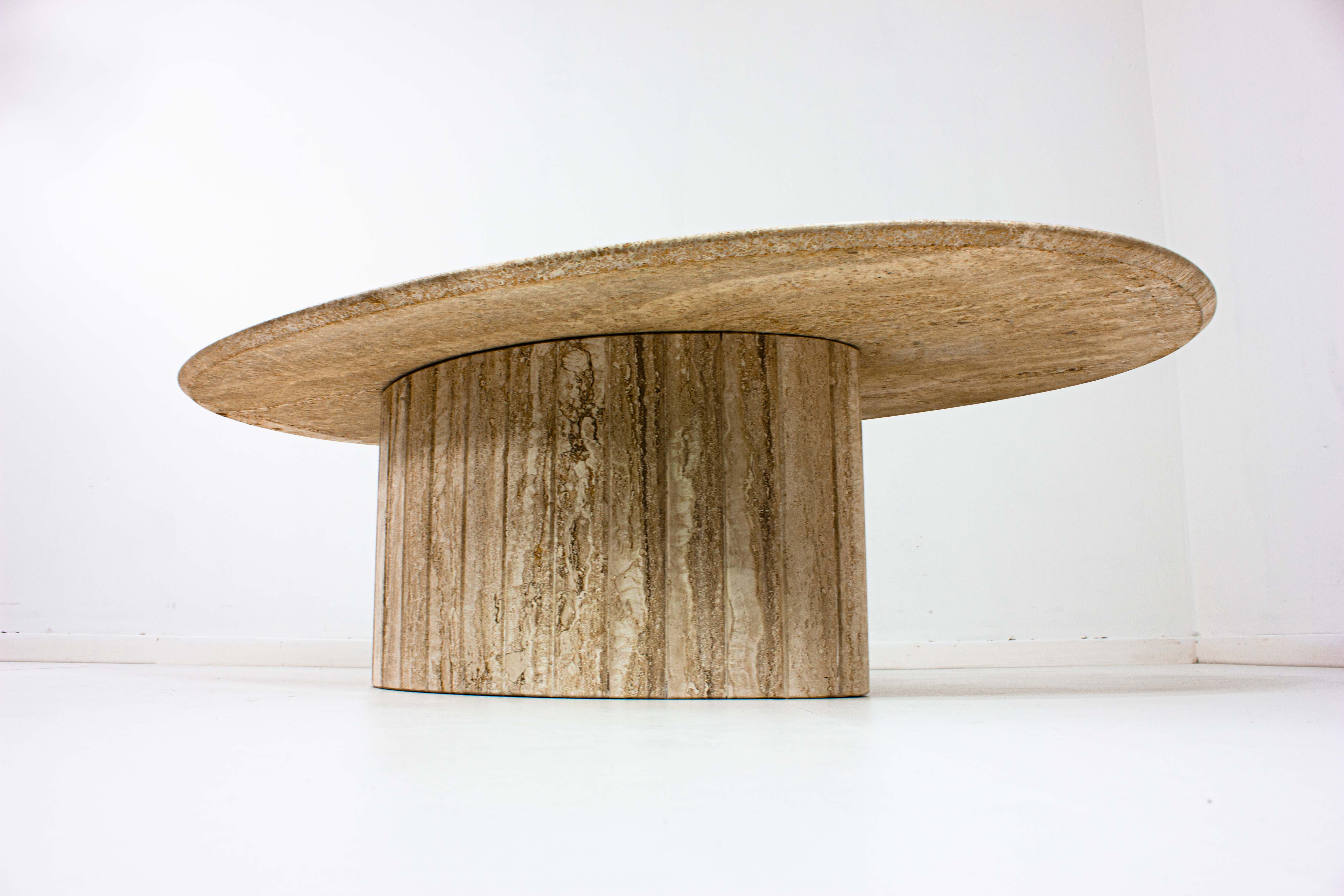 Oval Italian coffee table in travertin, 1970s
