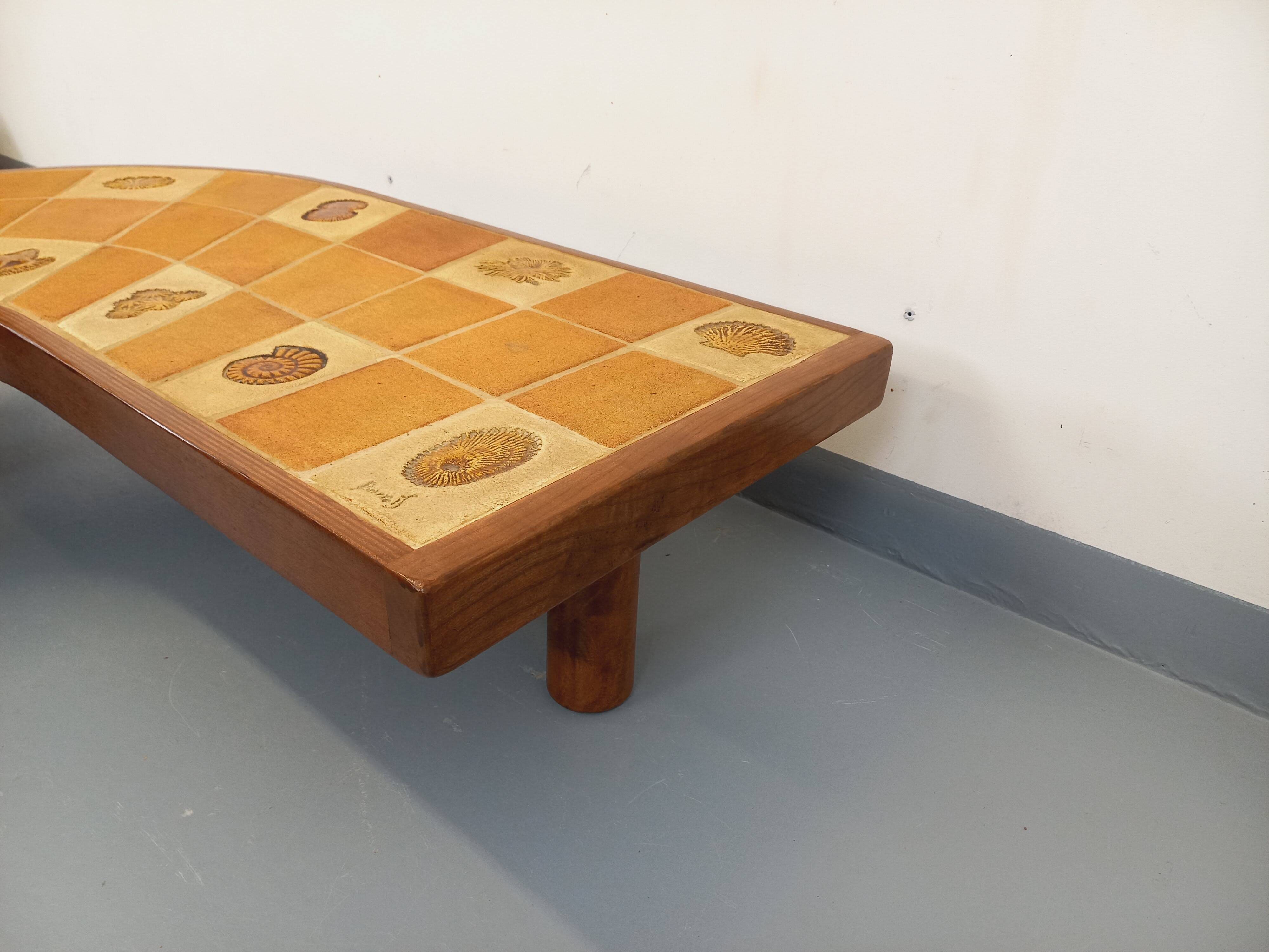 Barrois vintage shell-patterned comma coffee table in wood and ceramic.