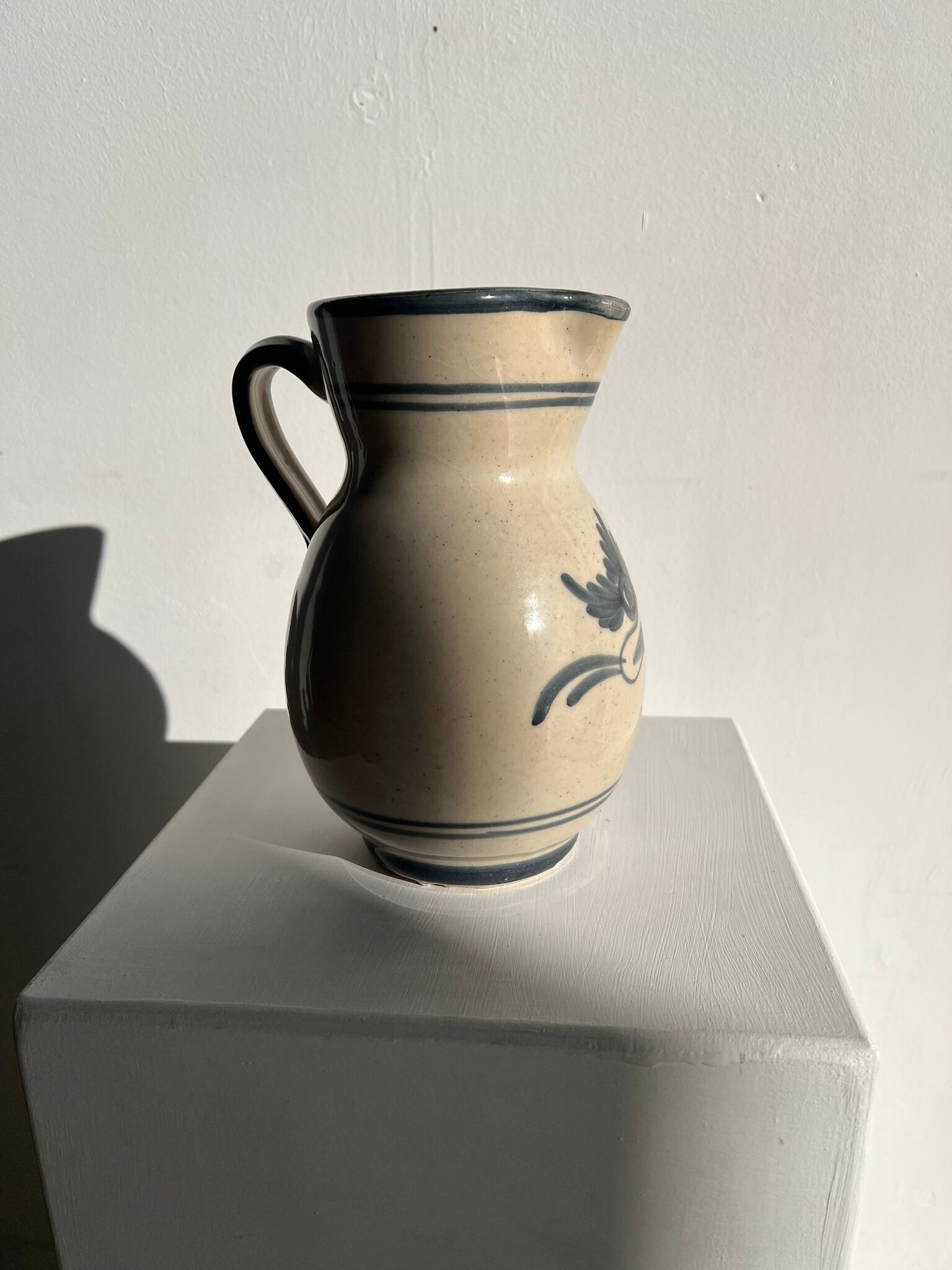 Off-white glossy ceramic decanter, hand-painted gray blue patterns H:20cm