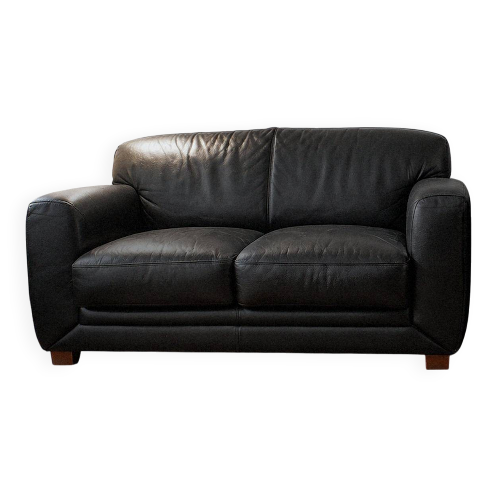 Leather sofa and armchair in black cowhide, brand Steiner.