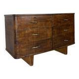 A vintage Italian chest of drawers, made of veneered walnut and solid wood,
