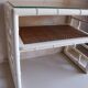 Pair of bedside tables in bamboo effect wood and woven wicker