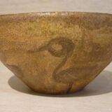 Chamotte clay bowl with bird decoration