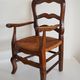 Children's armchair in solid wood with its mulched seat