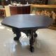 Octagonal oak table, 19th century, with griffins.