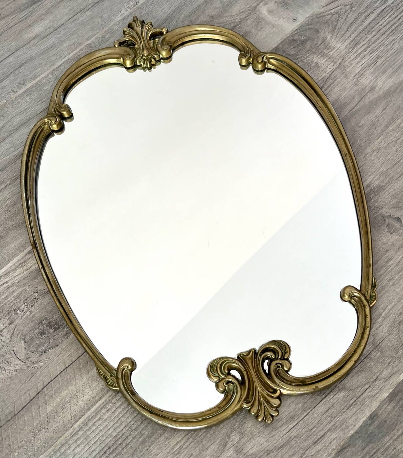 Vintage and rare gilt brass medallion/oblong/olave/rococo mirror