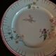 Flat earthenware plate by Choisy le Roi for Au vase étrusque Paris