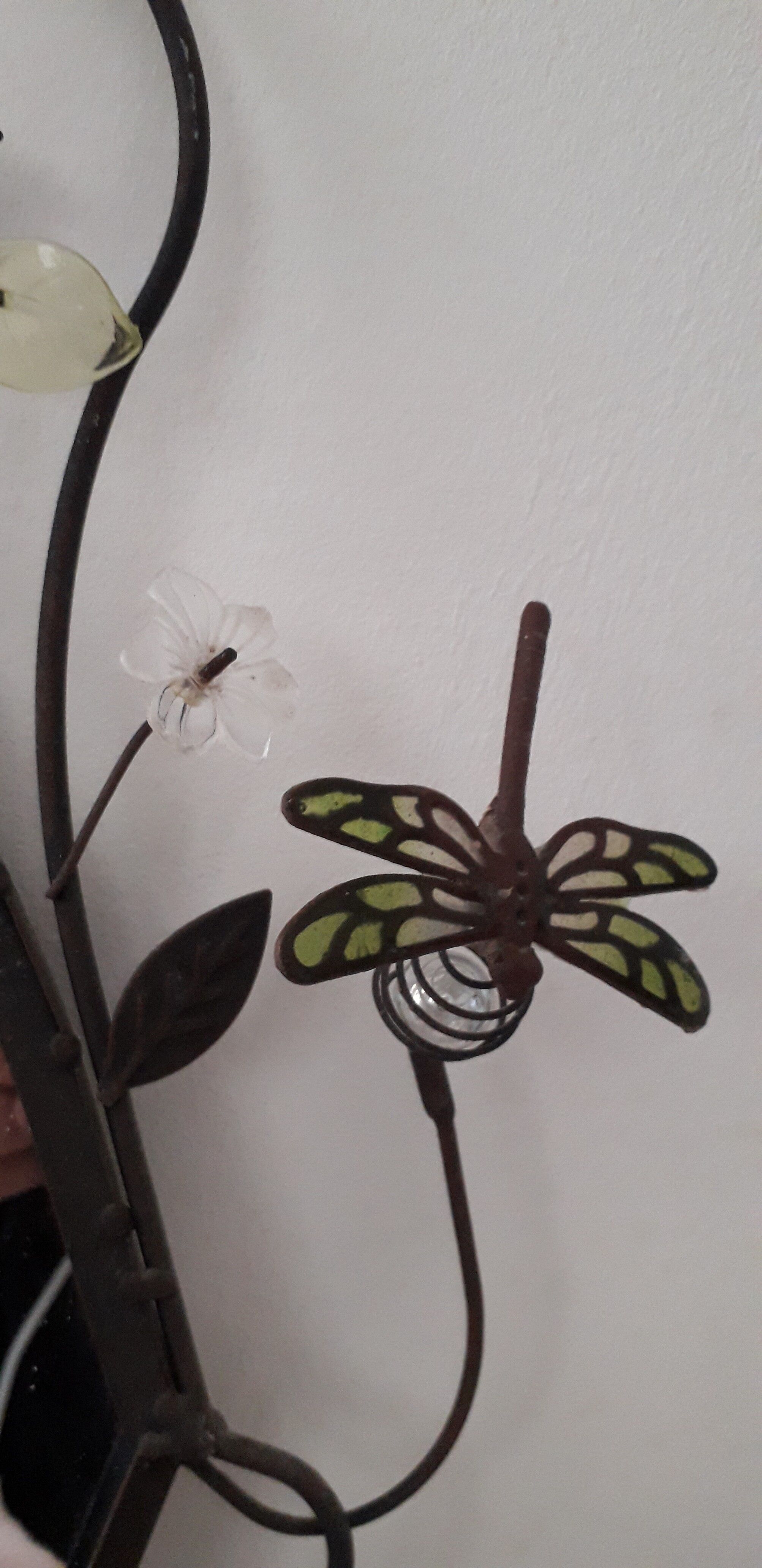 Mirror of shape with flower and dragonfly patterns