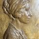 Patinated plaster bas-relief signed Robert Coutin, early 20th century.