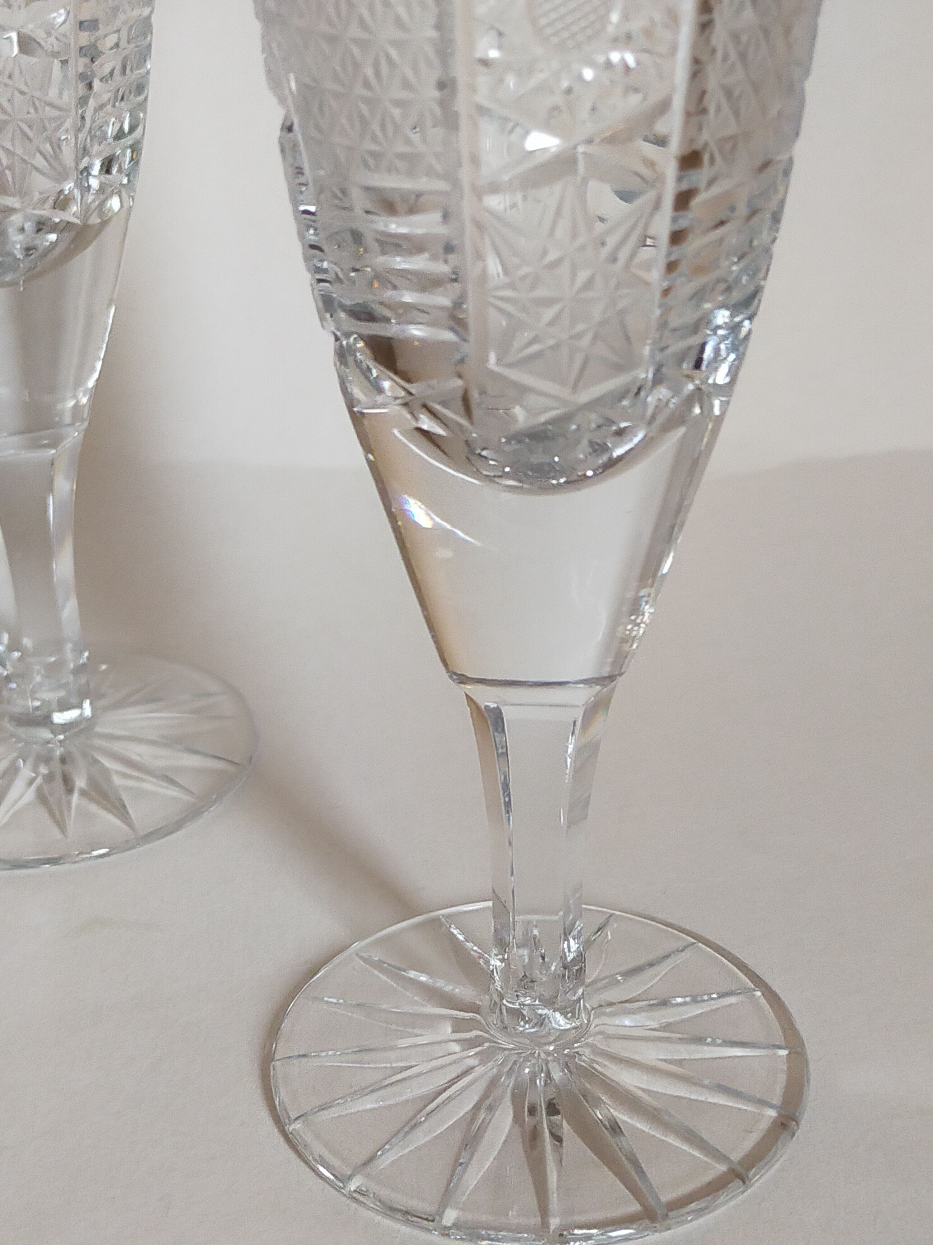 Five vintage cut crystal champagne flutes