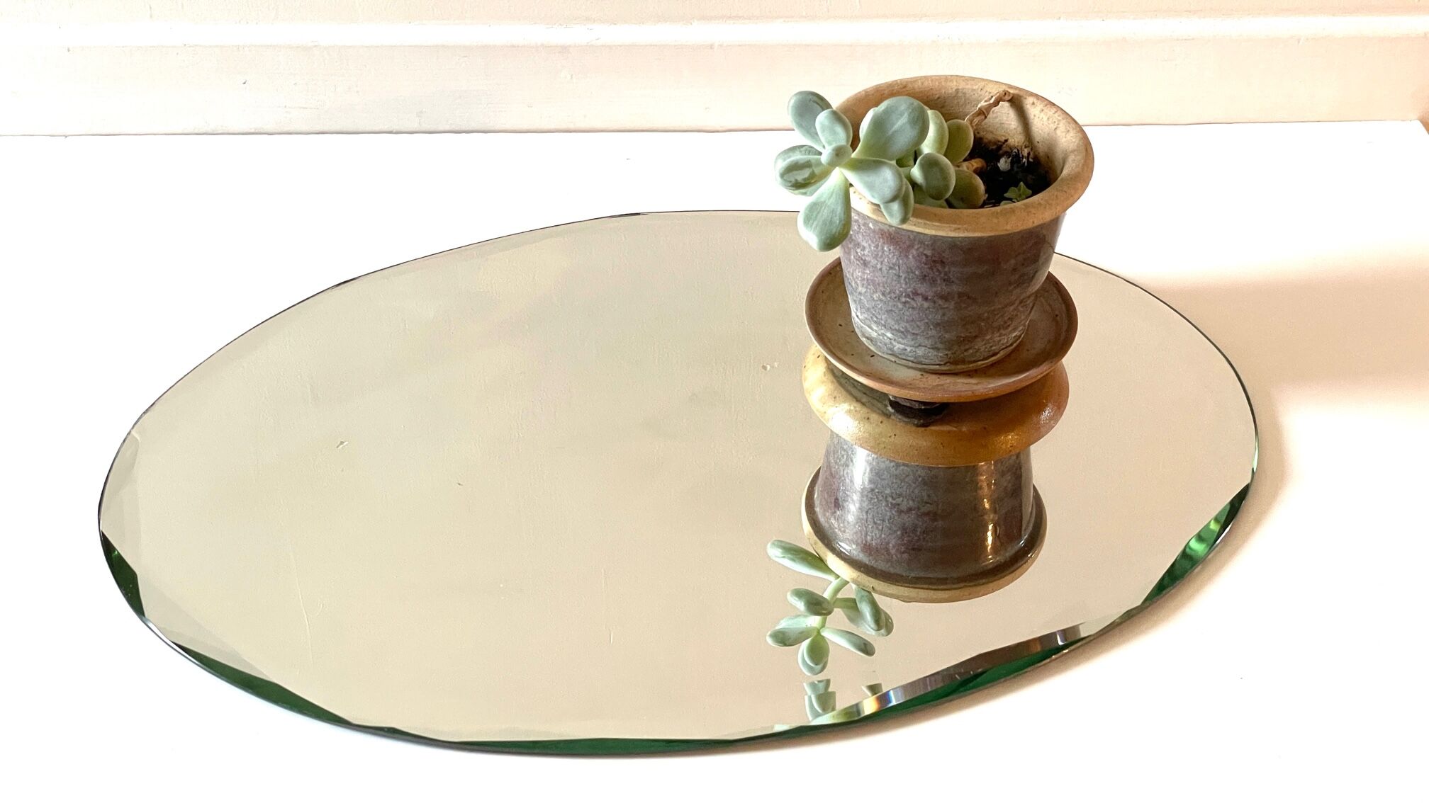 Vintage beveled oval table mirror