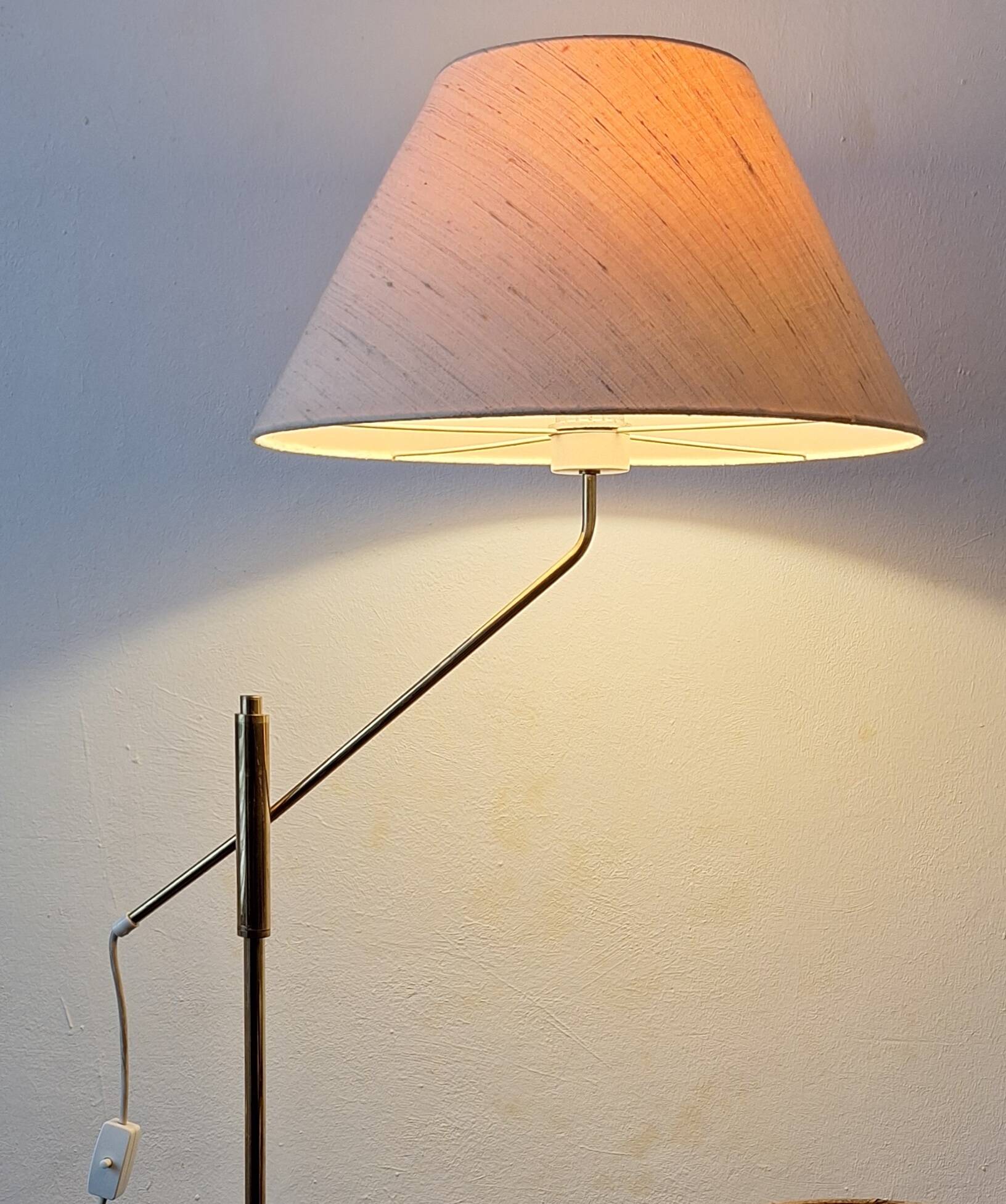 Mid century 360 deg. swing and height adjustable brass floor lamp, 1950s