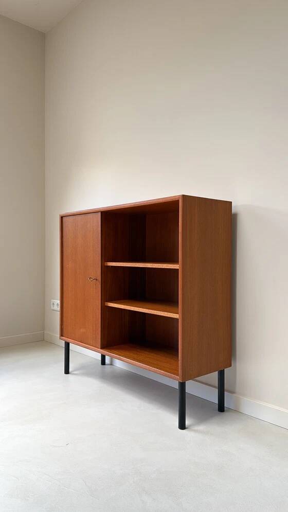 Vintage wooden cabinet with shelves and 1 door