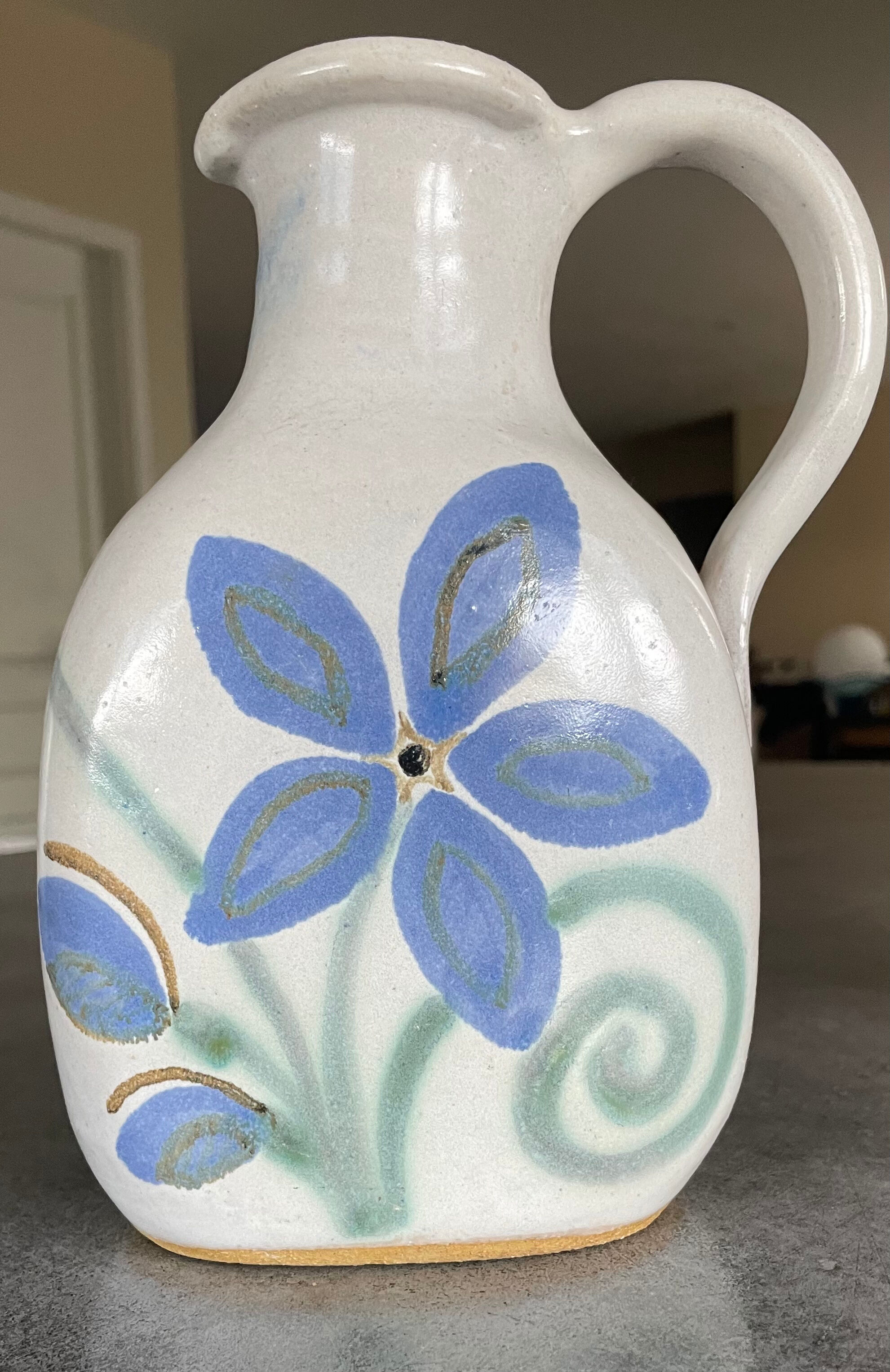 Vintage signed stoneware pitcher jug with floral painting decoration