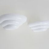Pair of Art Deco style wall lights in white lacquered metal. 1980s