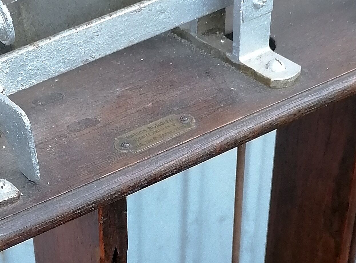 Old scale at pharmacy wood house rongier weighs person
