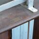 Old scale at pharmacy wood house rongier weighs person