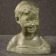 Sculpture en terre cuite d'un buste d'enfant