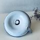 Antique candle holder in white and blue enamelled metal
