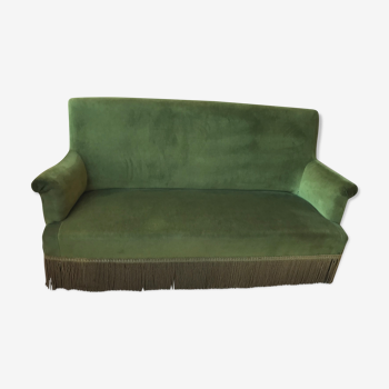 Vintage sofa in green velvet