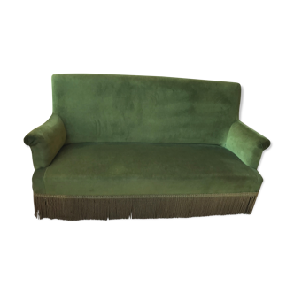 Vintage sofa in green velvet