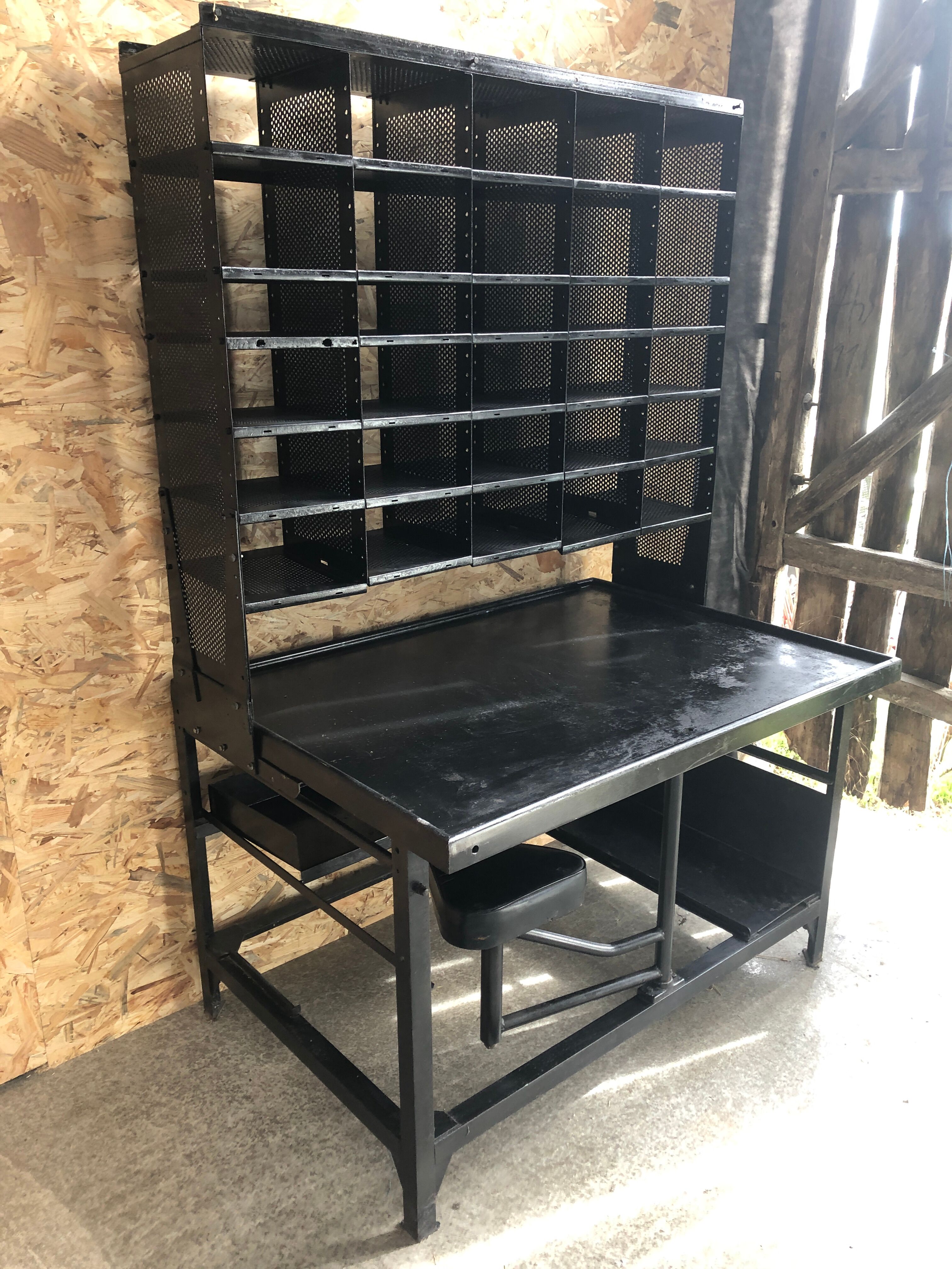 Old black metal postal sorting furniture + 30 perforated lockers + vintage stool