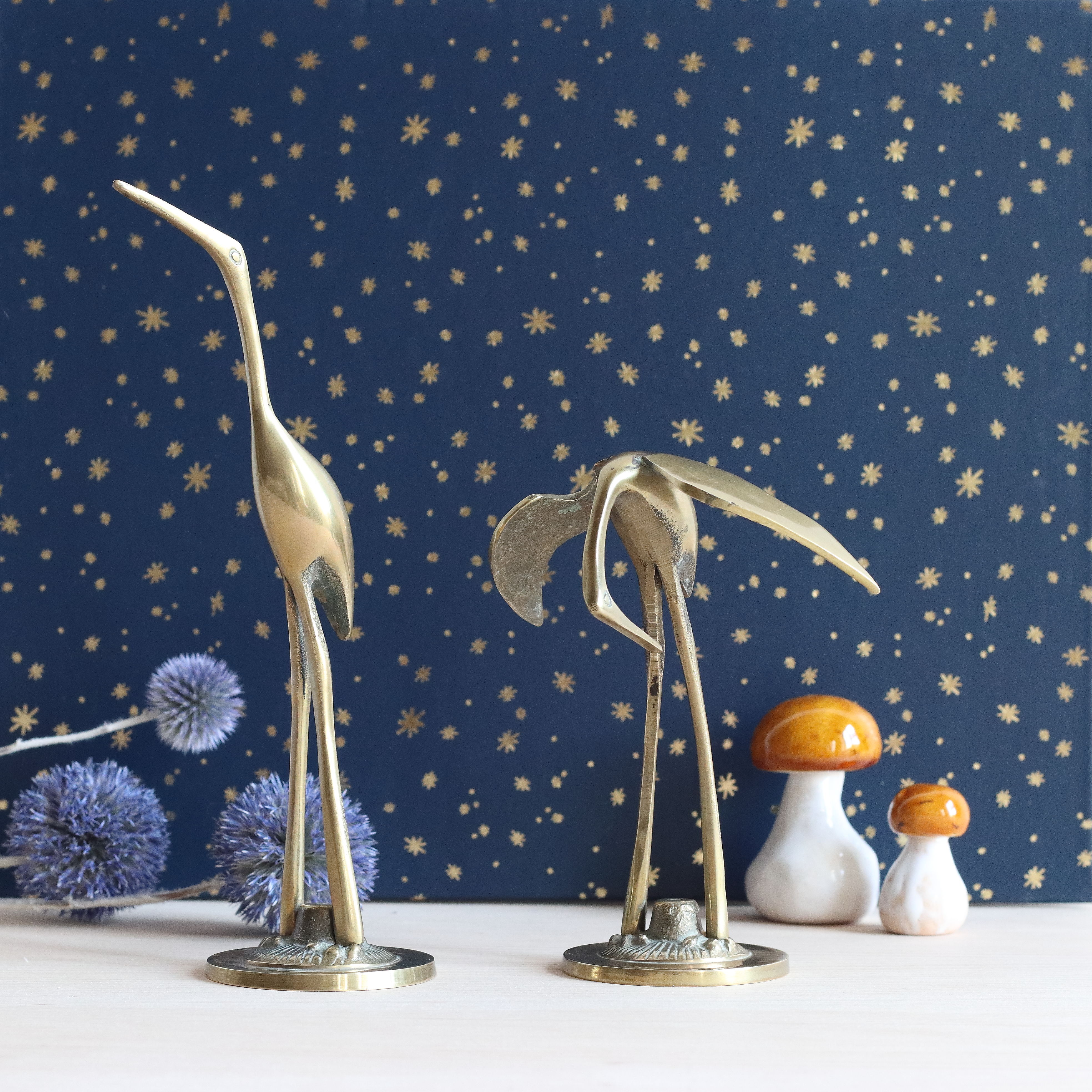 Couple of herons, golden brass